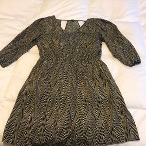 3/4 length patterned dress.